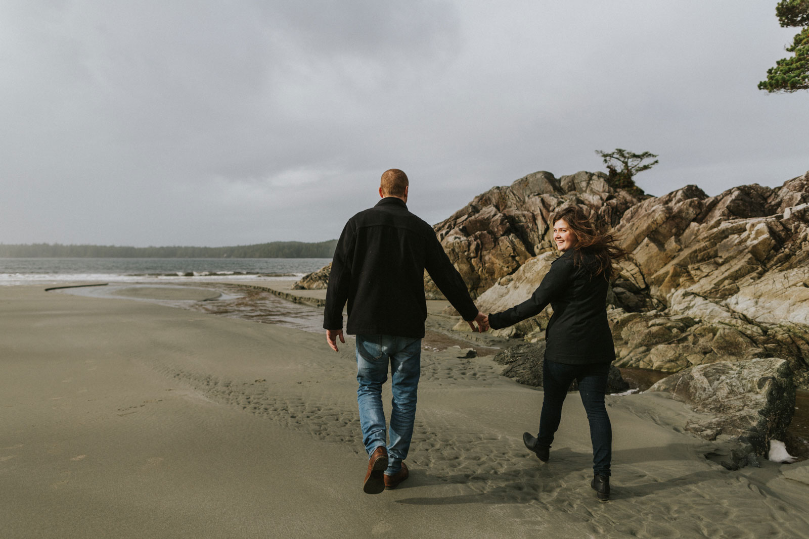 Holding hands and walking on the beach