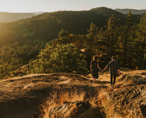 Holding hands and walking at Lone Tree Hill