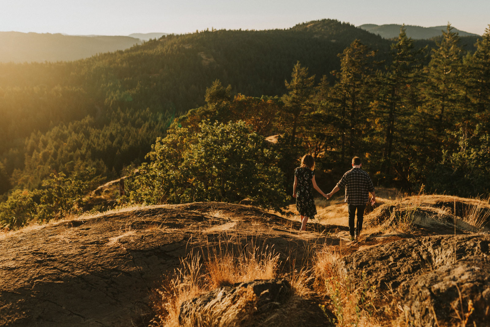 Holding hands and walking at Lone Tree Hill