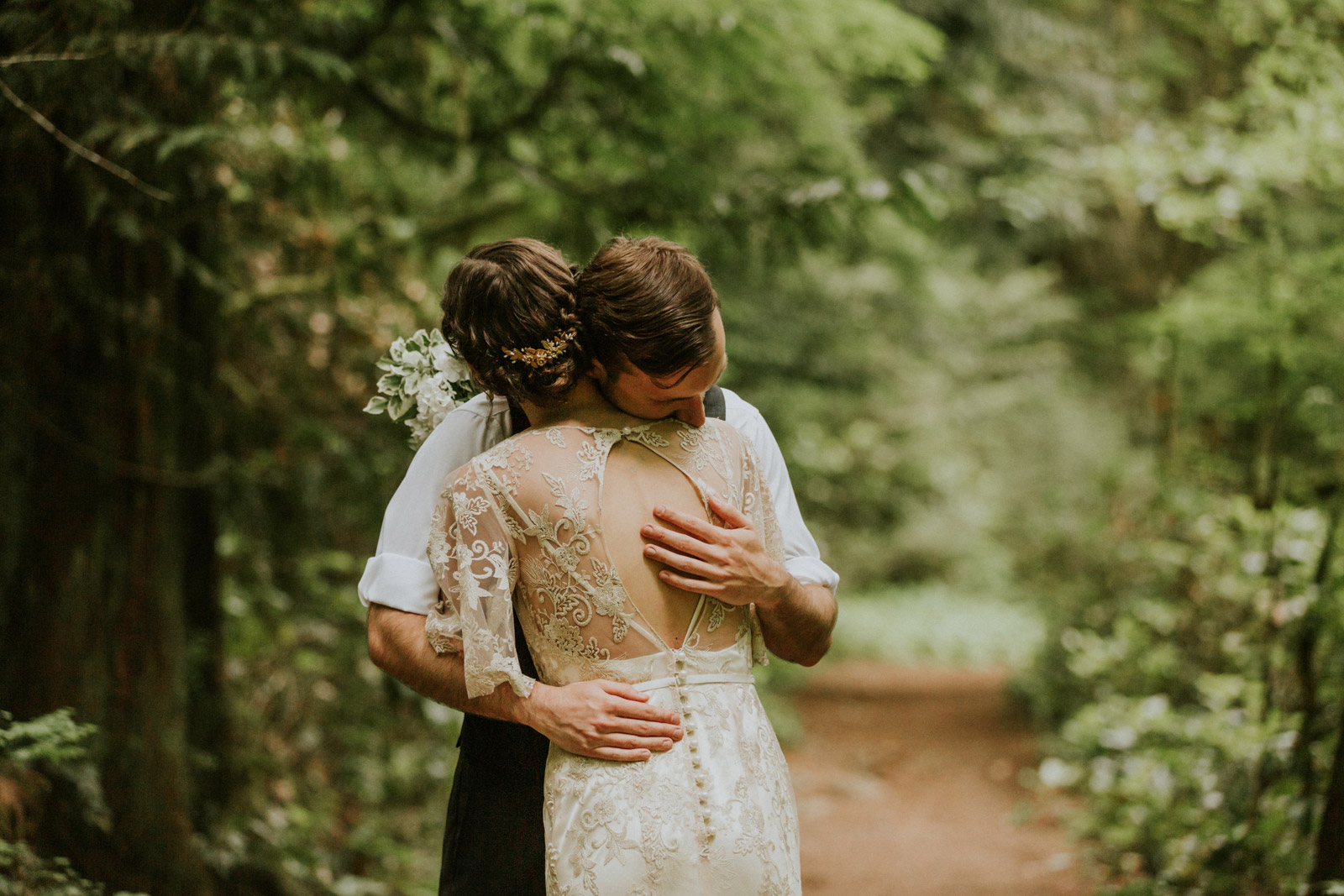 Bride and groom hugging